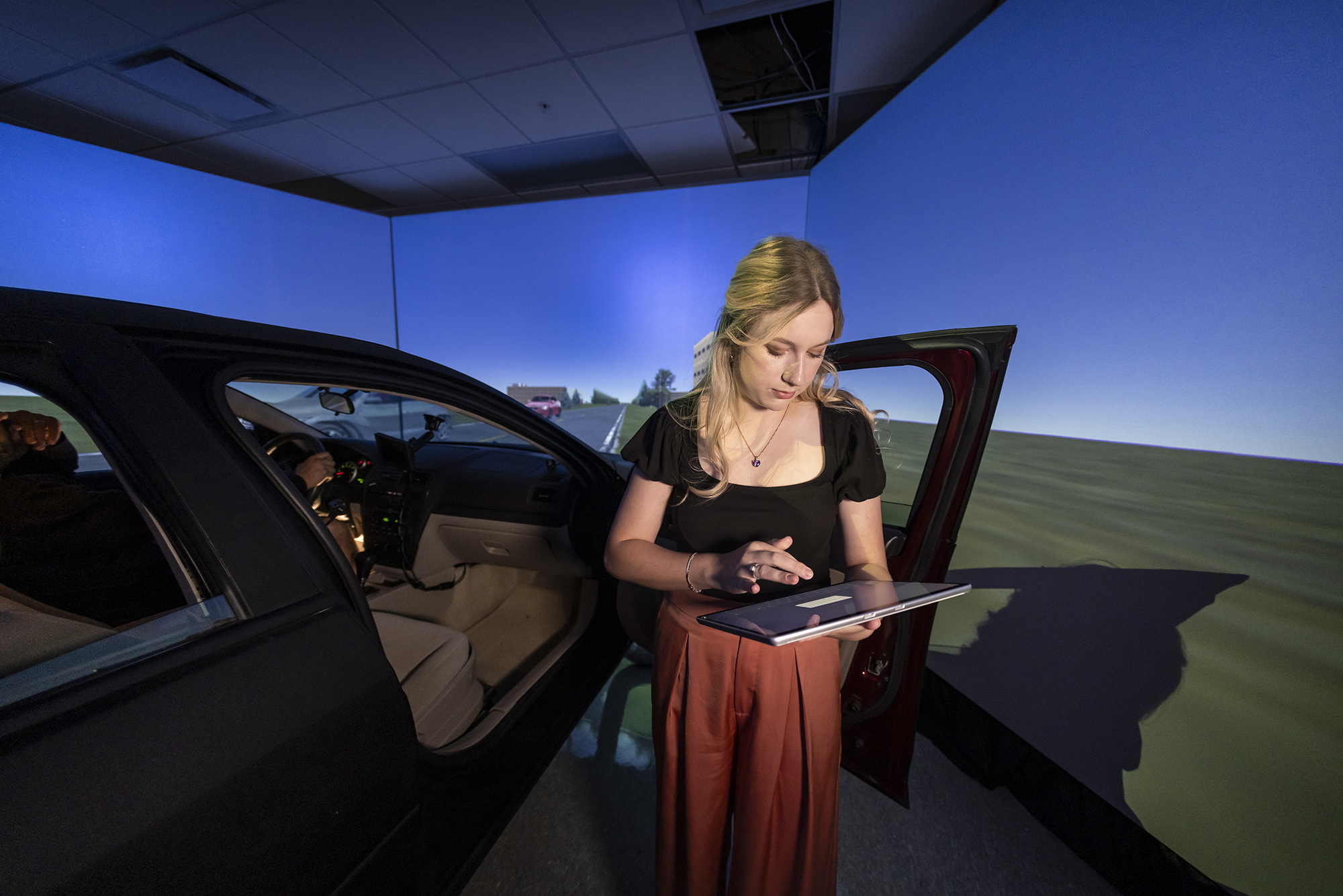 Hannah Hauck in driving simulator lab