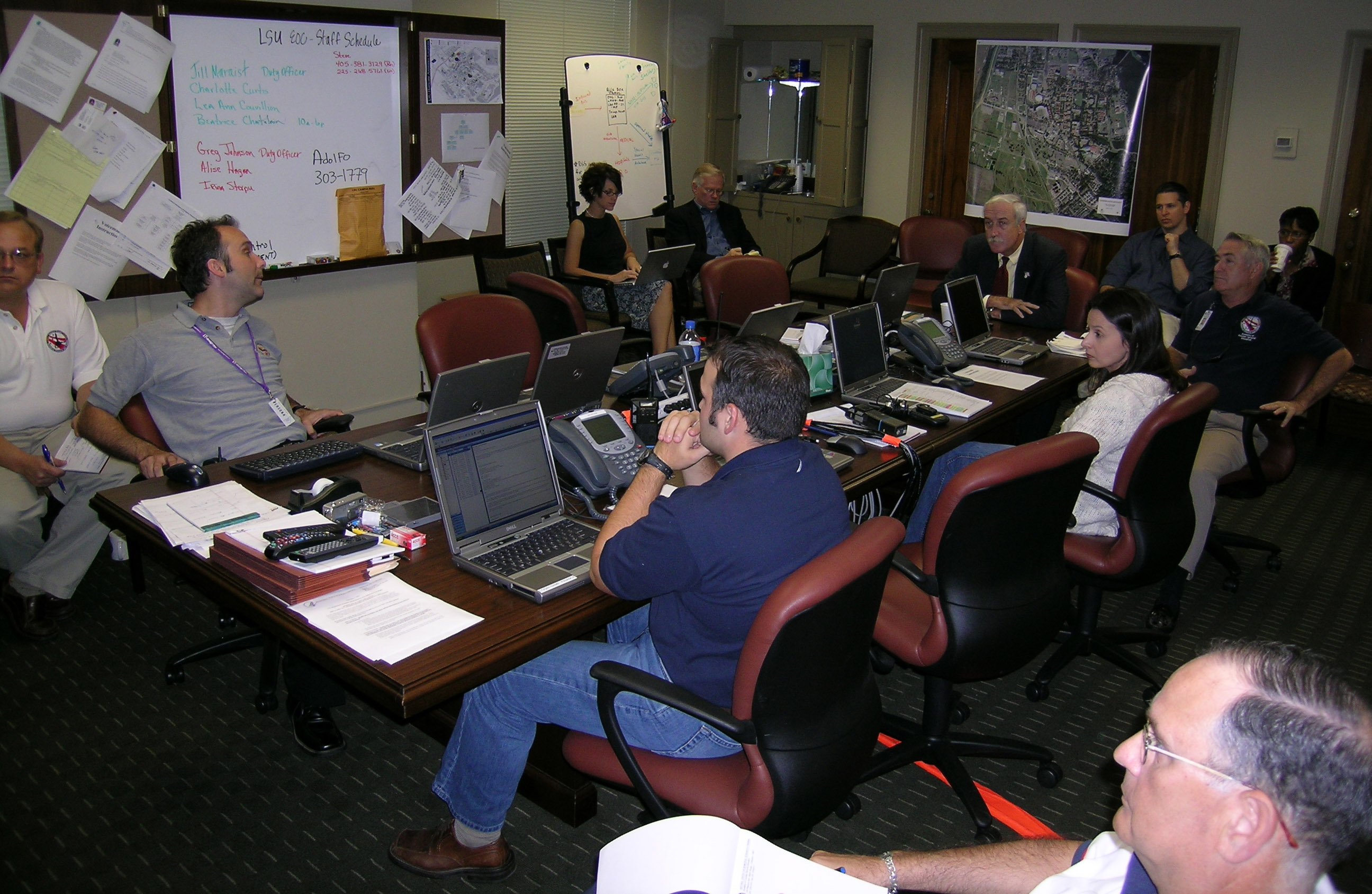NCBRT staff members brief Chancellor Sean O'Keefe in the EOC