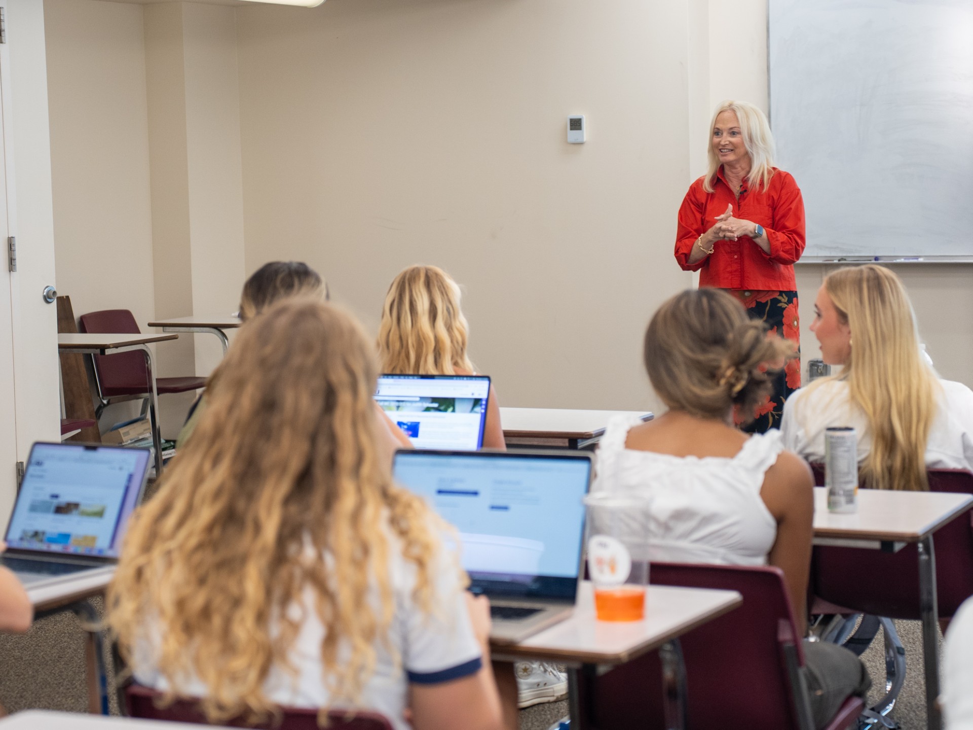 Students in a journalism building classroom